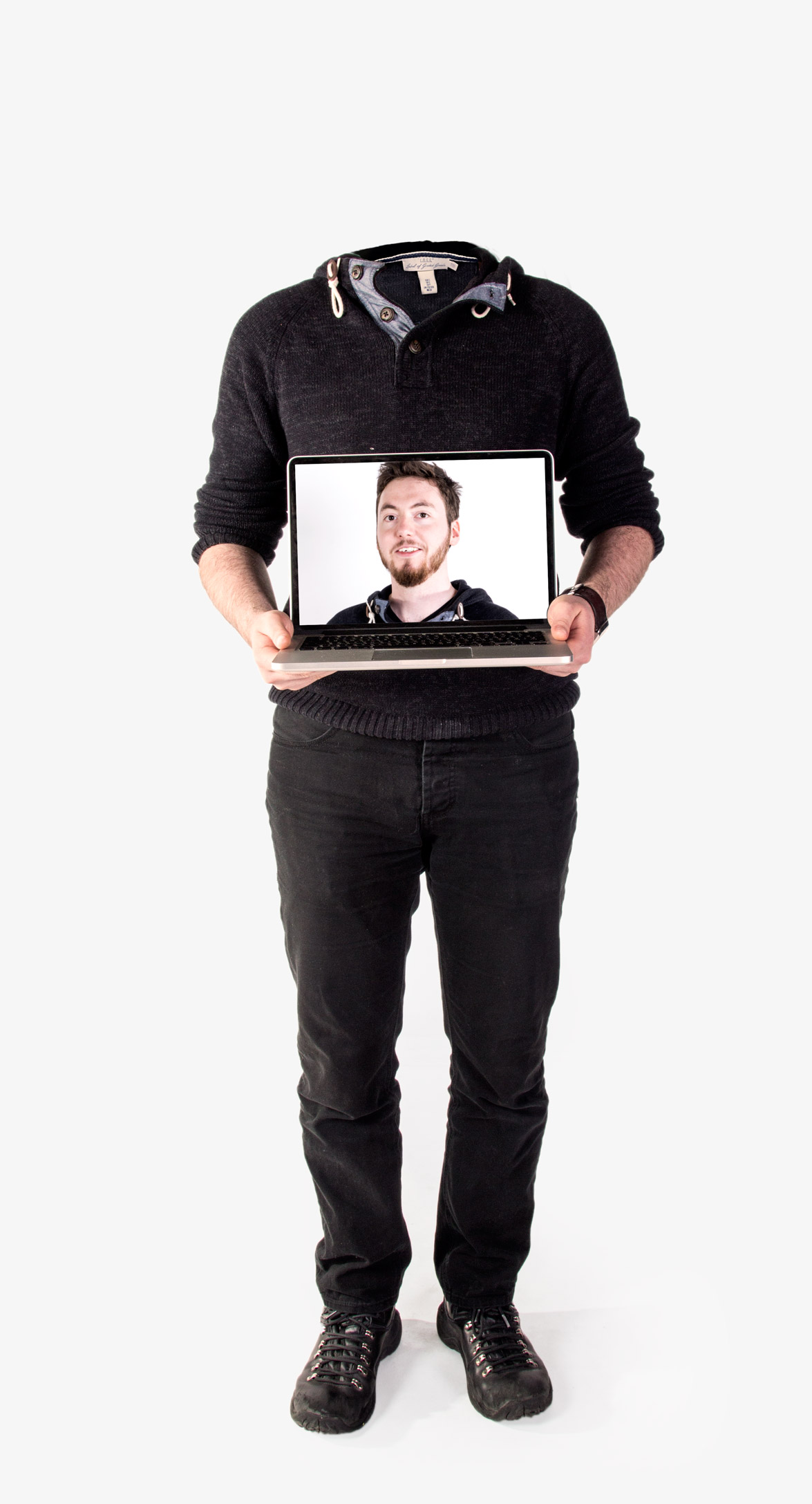 Headless body holding a laptop with a picture of Thibault Jan Beyer’s on screen